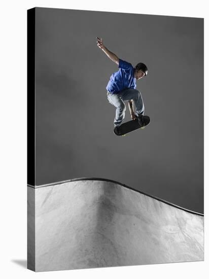 Skateboarder Performing Tricks-null-Stretched Canvas