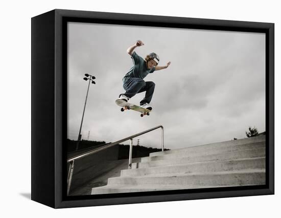 Skateboarder Performing Tricks-null-Framed Stretched Canvas