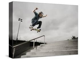 Skateboarder Performing Tricks-null-Stretched Canvas