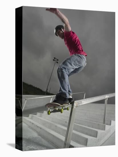 Skateboarder Performing Tricks-null-Stretched Canvas