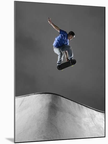 Skateboarder Performing Tricks-null-Mounted Photographic Print