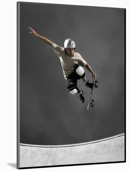 Skateboarder Performing Tricks-null-Mounted Photographic Print