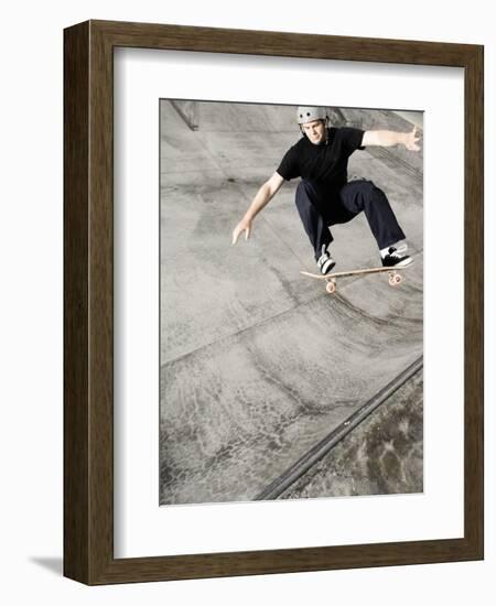 Skateboarder Performing Tricks-null-Framed Photographic Print