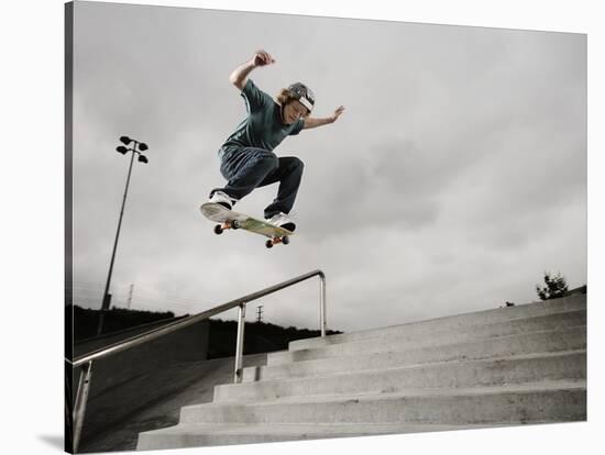 Skateboarder Performing Tricks-null-Stretched Canvas