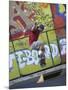 Skateboarder with Graffiti Background-null-Mounted Photographic Print