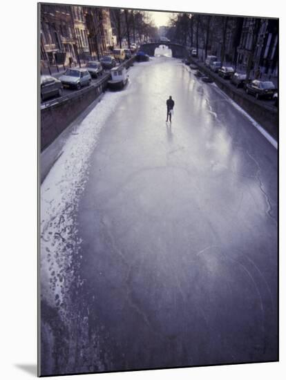 Skater on Frozen Canal, Amsterdam, Netherlands-Michele Molinari-Mounted Premium Photographic Print