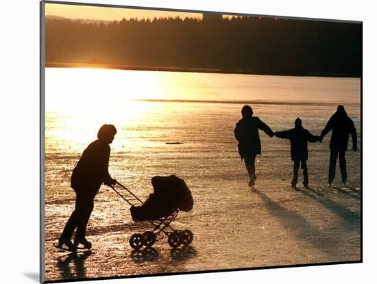 Skaters on the Frozen Lake Pilsensee-null-Mounted Photographic Print
