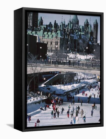 Skating on the Rideau Canal - Ottawa, Ontario, Canada-null-Framed Stretched Canvas