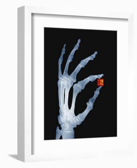 Skeletal Hand Holding Computer Chip-Charles O'Rear-Framed Photographic Print