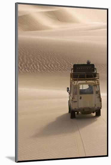 Skeleton Coast, Namibia. Land Rover Venturing Out over the Sand Dunes-Janet Muir-Mounted Photographic Print