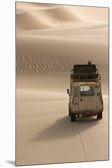 Skeleton Coast, Namibia. Land Rover Venturing Out over the Sand Dunes-Janet Muir-Mounted Premium Photographic Print