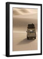 Skeleton Coast, Namibia. Land Rover Venturing Out over the Sand Dunes-Janet Muir-Framed Premium Photographic Print