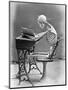 Skeleton Reading at Desk-Bettmann-Mounted Premium Photographic Print