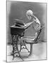 Skeleton Reading at Desk-Bettmann-Mounted Premium Photographic Print