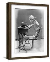 Skeleton Reading at Desk-Bettmann-Framed Photographic Print