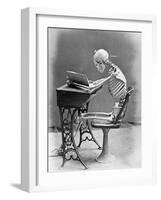 Skeleton Reading at Desk-Bettmann-Framed Photographic Print