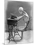 Skeleton Reading at Desk-Bettmann-Mounted Photographic Print