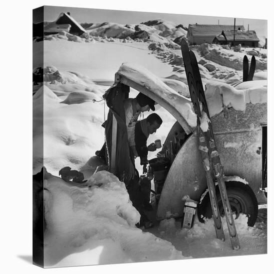 Ski Bum Bob Lombard Pouring Coffee from the Back of His Trailer-Loomis Dean-Stretched Canvas