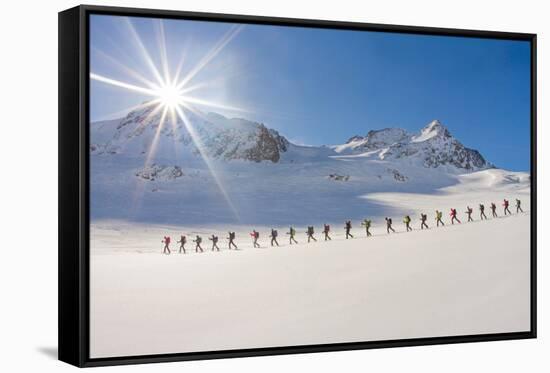 Ski mountaineers in the hochniochferner glacier, Austria, Europe.-ClickAlps-Framed Stretched Canvas