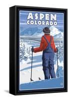 Skier Admiring - Aspen, Colorado-Lantern Press-Framed Stretched Canvas