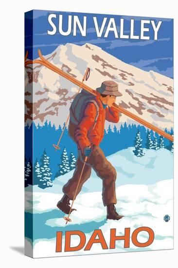 Skier Carrying Snow Skis, Sun Valley, ID-Lantern Press-Stretched Canvas
