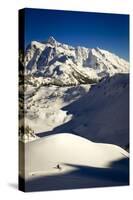 Skier Drops Into Mazama Bowl In Late Afternoon Light With Mount Shuksan In The Distance-Jay Goodrich-Stretched Canvas