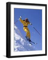 Skier in Yellow Against a Blue Sky-null-Framed Photographic Print