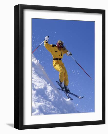 Skier in Yellow Against a Blue Sky-null-Framed Photographic Print