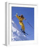 Skier in Yellow Against a Blue Sky-null-Framed Photographic Print