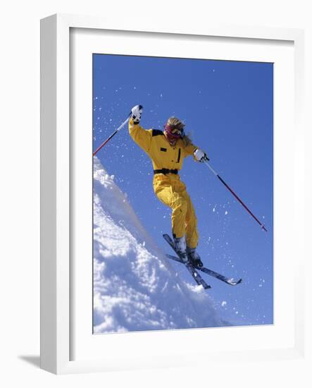 Skier in Yellow Against a Blue Sky-null-Framed Photographic Print