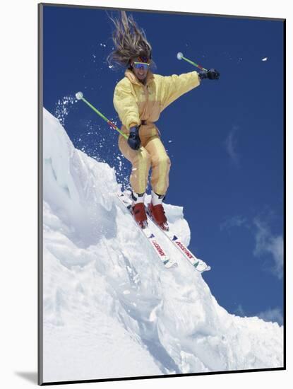 Skier in Yellow with Streaming Hair-null-Mounted Photographic Print