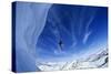 Skier Jumping from Mountain Ledge-null-Stretched Canvas