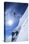 Skier Jumping from Mountain Ledge-null-Stretched Canvas