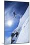 Skier Jumping from Mountain Ledge-null-Mounted Photo