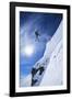 Skier Jumping from Mountain Ledge-null-Framed Photo