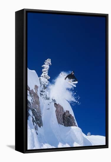 Skier Jumping from Mountain Ledge-null-Framed Stretched Canvas