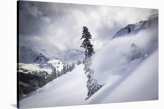 Skier Makes Some Steep Angle Powder Turns In Cascades Of Washington As A Snow Storm Begins To Clear-Jay Goodrich-Stretched Canvas