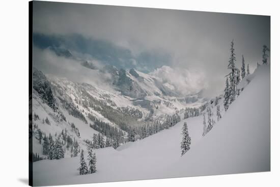 Skier Makes Some Steep Angle Powder Turns In Cascades Of Washington As A Snow Storm Begins To Clear-Jay Goodrich-Stretched Canvas