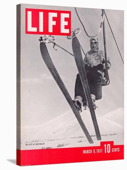 Skier Riding the Chair Lift at Sun Valley Ski Resort, March 8, 1937-Alfred Eisenstaedt-Stretched Canvas