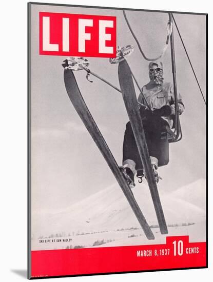 Skier Riding the Chair Lift at Sun Valley Ski Resort, March 8, 1937-Alfred Eisenstaedt-Mounted Premium Photographic Print