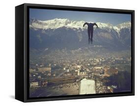 Skier Taking Off from the Bergisel Jump Hangs During Innsbruck Winter Olympics Competition-Ralph Crane-Framed Stretched Canvas