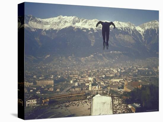 Skier Taking Off from the Bergisel Jump Hangs During Innsbruck Winter Olympics Competition-Ralph Crane-Stretched Canvas