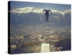 Skier Taking Off from the Bergisel Jump Hangs During Innsbruck Winter Olympics Competition-Ralph Crane-Stretched Canvas