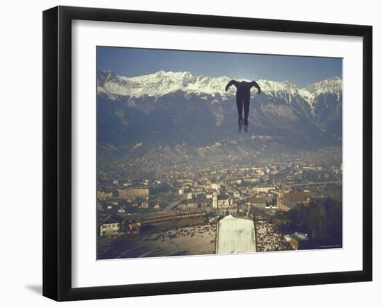 Skier Taking Off from the Bergisel Jump Hangs During Innsbruck Winter Olympics Competition-Ralph Crane-Framed Photographic Print