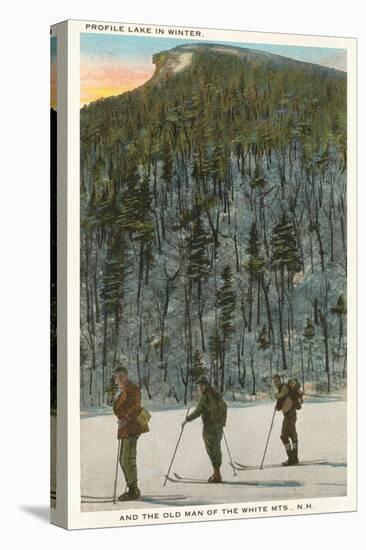 Skiers by Old Man of the Mountain, New Hampshire-null-Stretched Canvas