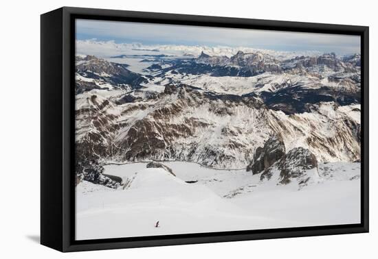 Skiers descend from the top of Marmolada in the Dolomites, Italy, Europe-Alex Treadway-Framed Stretched Canvas