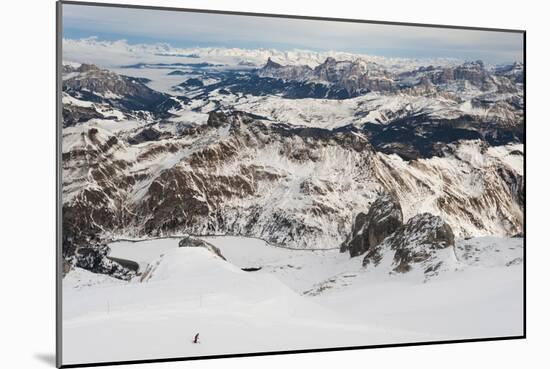 Skiers descend from the top of Marmolada in the Dolomites, Italy, Europe-Alex Treadway-Mounted Premium Photographic Print