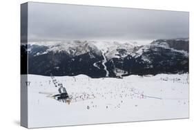 Skiers in the mountains, Dolomites, Italy, Europe-Alex Treadway-Stretched Canvas