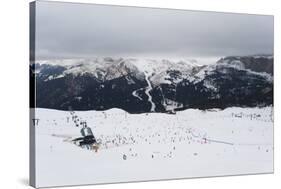 Skiers in the mountains, Dolomites, Italy, Europe-Alex Treadway-Stretched Canvas