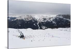 Skiers in the mountains, Dolomites, Italy, Europe-Alex Treadway-Stretched Canvas